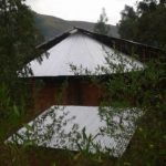Side right view of the orutindo hut after new roof.